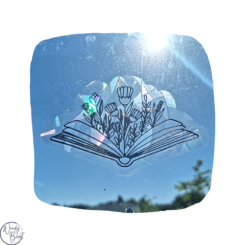 Raamsticker op statische regenboogfolie - Open boek met bloemen